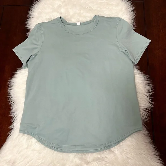 Lululemon Size 8 High-Neck Running and Training T-Shirt
Silver Blue Light Green - Picture 5 of 13